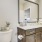 a bathroom with a large mirror