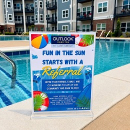 a flyer in front of a pool