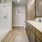 Model bathroom at our 55 and over apartments in Hamilton County, featuring a large shower with glass doors.