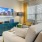 a living room with a tv and couches