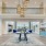 a large room with a chandelier and a table