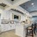 a kitchen with white cabinets