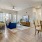 a large living room with a wood floor