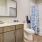 a bathroom with a tub toilet and sink